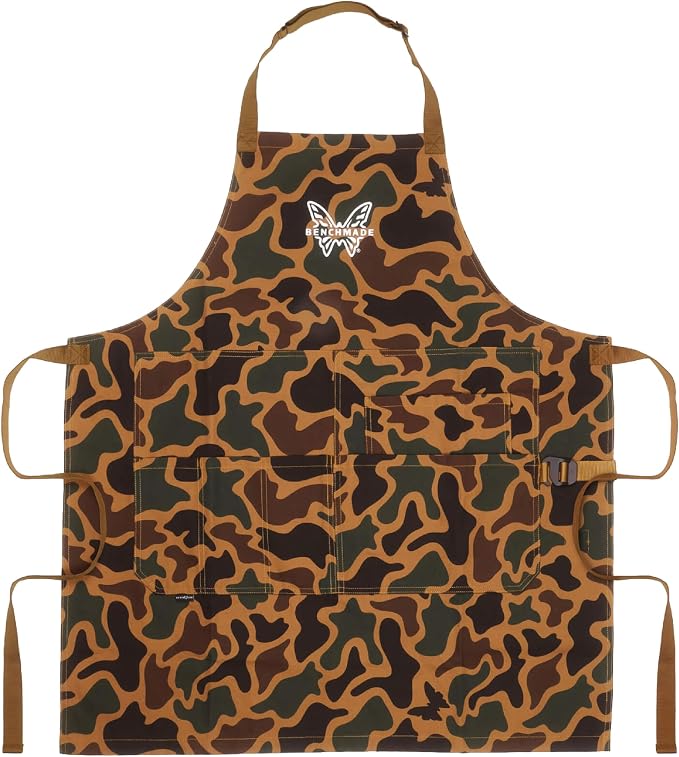 A multi-pocket utility apron featuring a brown, green, and black camouflage pattern, with a white embroidered butterfly logo on the upper chest. It has a neck strap, waist ties, and multiple front pockets.
