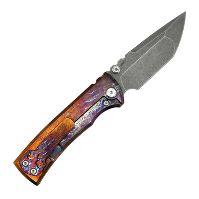 Folding knife with a wooden handle on a white background