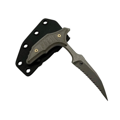 Folding knife with a black blade and metallic handle on a light gray background