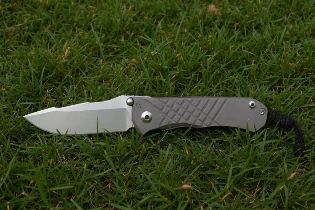 Folding knife on grass