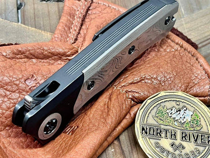 Heretic Knives Custom Wraith Manual T/E DLC Titanium Handle w/ Vegas Forge Wood Grain Damascus Inlay Hand Compound Ground Vegas Forge Wood Grain San Mai Damascus Blade - NORTH RIVER OUTDOORS