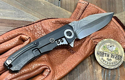 Heretic Knives Custom Wraith Manual T/E DLC Titanium Handle w/ Vegas Forge Wood Grain Damascus Inlay Hand Compound Ground Vegas Forge Wood Grain San Mai Damascus Blade - NORTH RIVER OUTDOORS