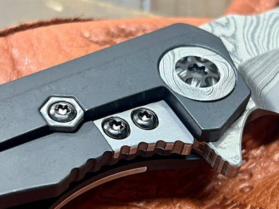 Heretic Knives Custom Wraith Manual T/E DLC Titanium Handle w/ Vegas Forge Wood Grain Damascus Inlay Hand Compound Ground Vegas Forge Wood Grain San Mai Damascus Blade - NORTH RIVER OUTDOORS