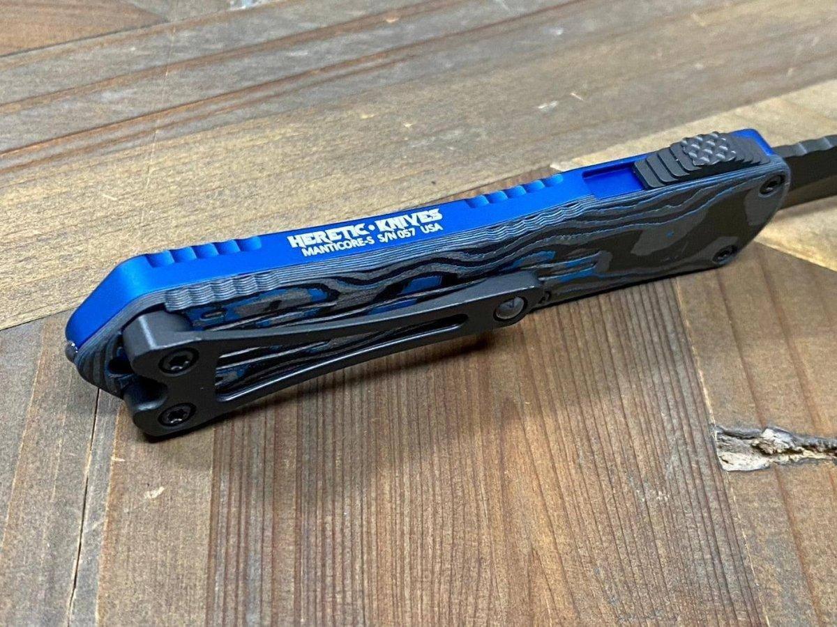 Heretic Knives Manticore S OTF Auto 2.55" MagnaCut Black DLC Recurve Blade, Blue Aluminum Handle with Blue CamoCarbon - NORTH RIVER OUTDOORS