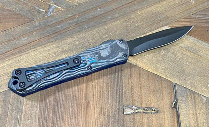 Heretic Knives Manticore S OTF Auto 2.55" MagnaCut Black DLC Recurve Blade, Blue Aluminum Handle with Blue CamoCarbon - NORTH RIVER OUTDOORS