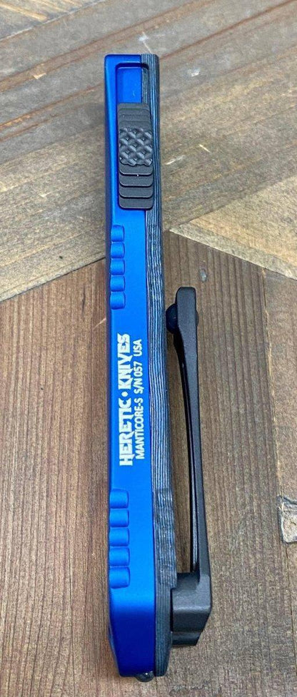Heretic Knives Manticore S OTF Auto 2.55" MagnaCut Black DLC Recurve Blade, Blue Aluminum Handle with Blue CamoCarbon - NORTH RIVER OUTDOORS