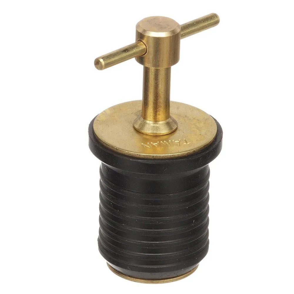 Brass and black mechanical component on a white background