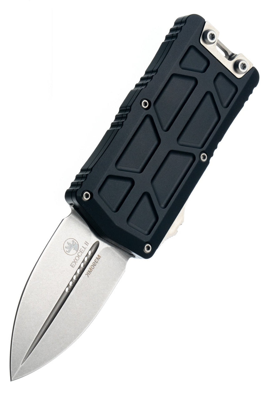 Black folding knife with a metallic blade on a white background