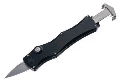 Black folding knife with a silver blade on a white background