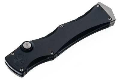 Black folding knife on a white background