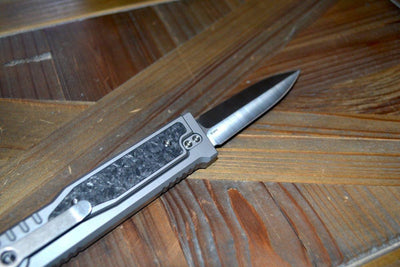 REATE EXO-M OTF GRAVITY KNIFE TITANIUM/CARBON FIBER 2.95" DOUBLE EDGE SATIN - NORTH RIVER OUTDOORS