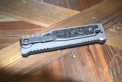 REATE EXO-M OTF GRAVITY KNIFE TITANIUM/CARBON FIBER 2.95" DOUBLE EDGE SATIN - NORTH RIVER OUTDOORS