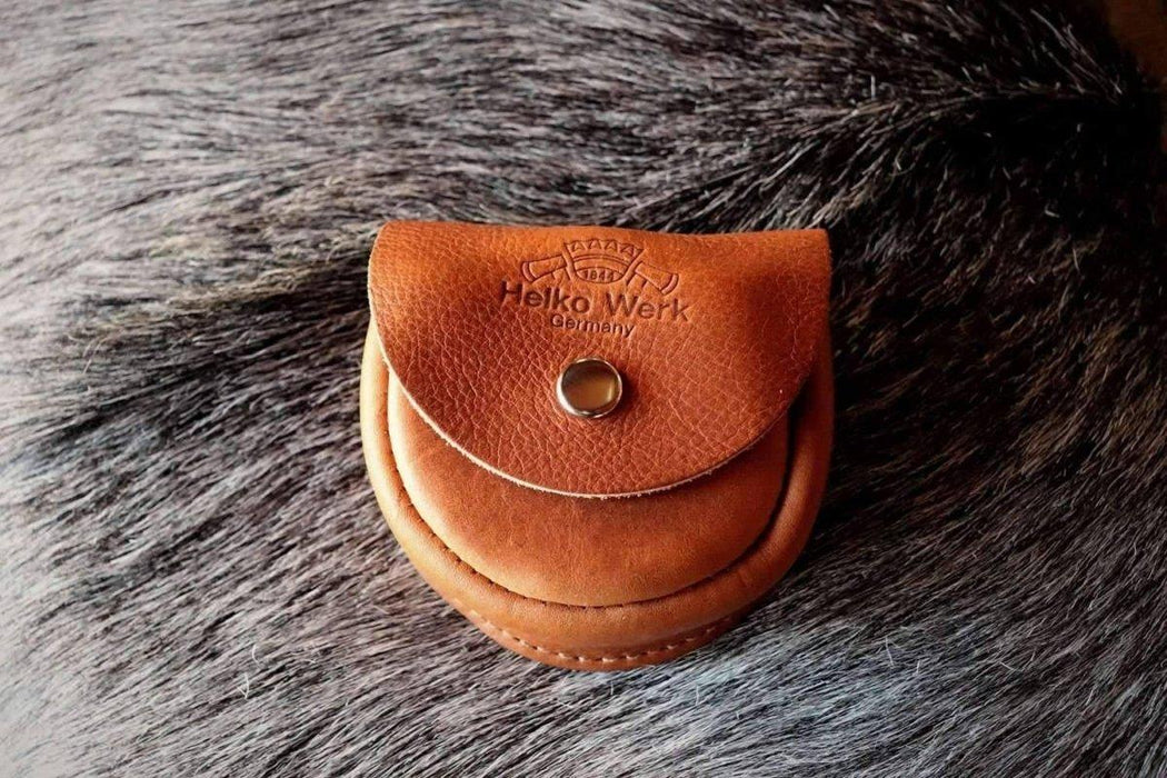 https://www.northriveroutdoors.com/cdn/shop/products/helko-sharpening-stone-leather-pouch-made-in-usa-north-river-outdoors-2_1050x700.jpg?v=1694649432