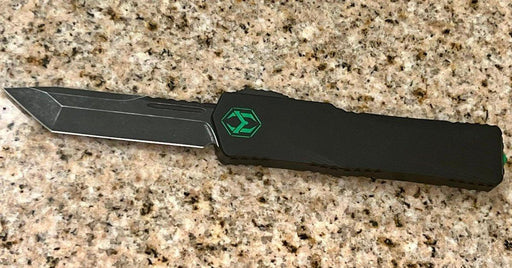 Heretic Knives Colossus T/E Blade Show '23 Black Slab Handle w/ Deep Engraved Heretic Green Logo Battle Black Blade from NORTH RIVER OUTDOORS