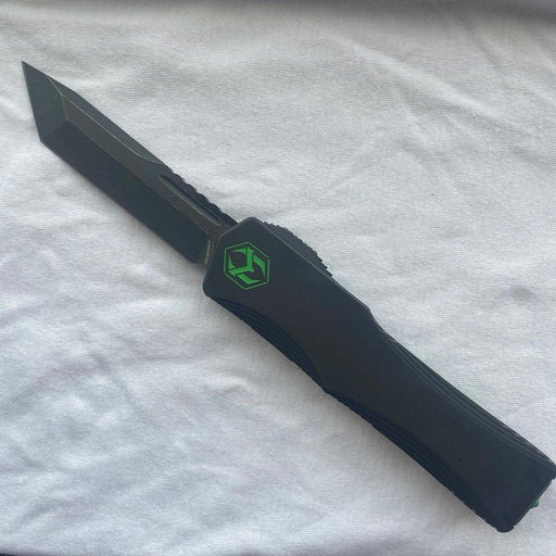 Heretic Knives Colossus T/E Blade Show '23 Black Slab Handle w/ Deep Engraved Heretic Green Logo Battle Black Blade from NORTH RIVER OUTDOORS