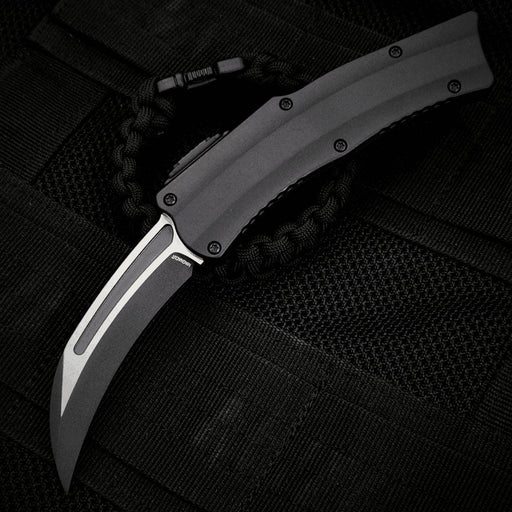 Heretic Knives Roc OTF Auto Knife 3.2" MagnaCut Two Tone Black Hawkbill Blade from NORTH RIVER OUTDOORS