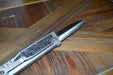 REATE EXO-M OTF GRAVITY KNIFE TITANIUM/CARBON FIBER 2.95" DOUBLE EDGE SATIN - NORTH RIVER OUTDOORS